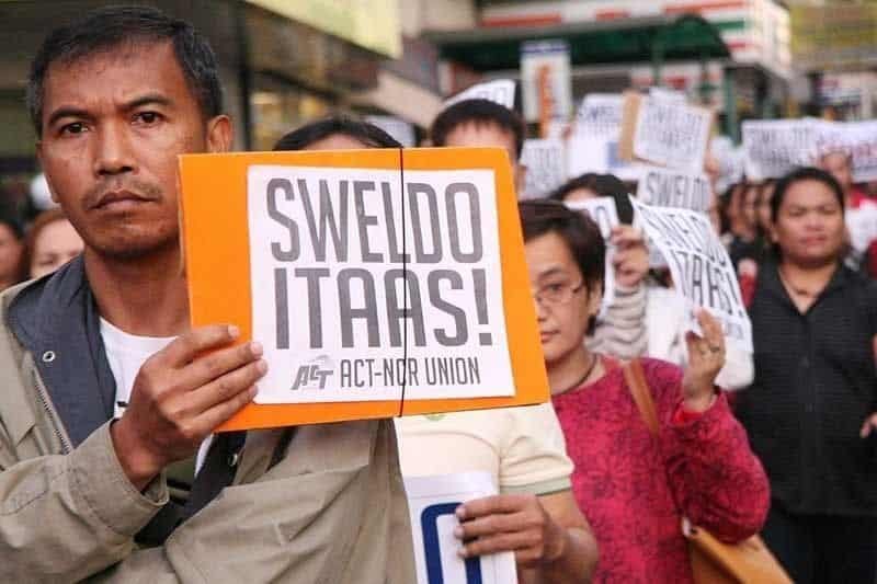 wage hike protesters on the street